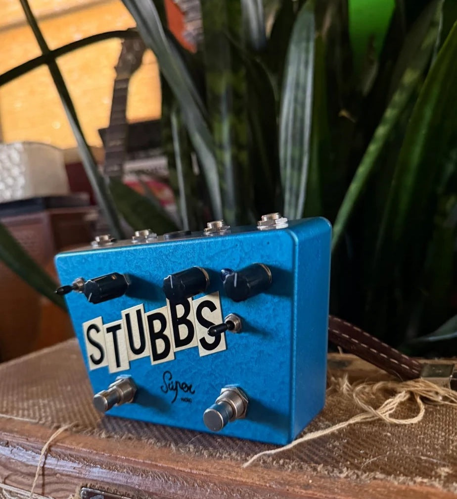 The Stubbs pedal, three-quarter view showing knobs, toggles and the four top jacks